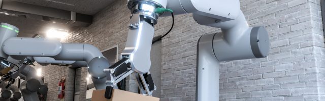 Dos cobots trabajando cogiendo cajas. Dos cobots trabajando cogiendo cajas.